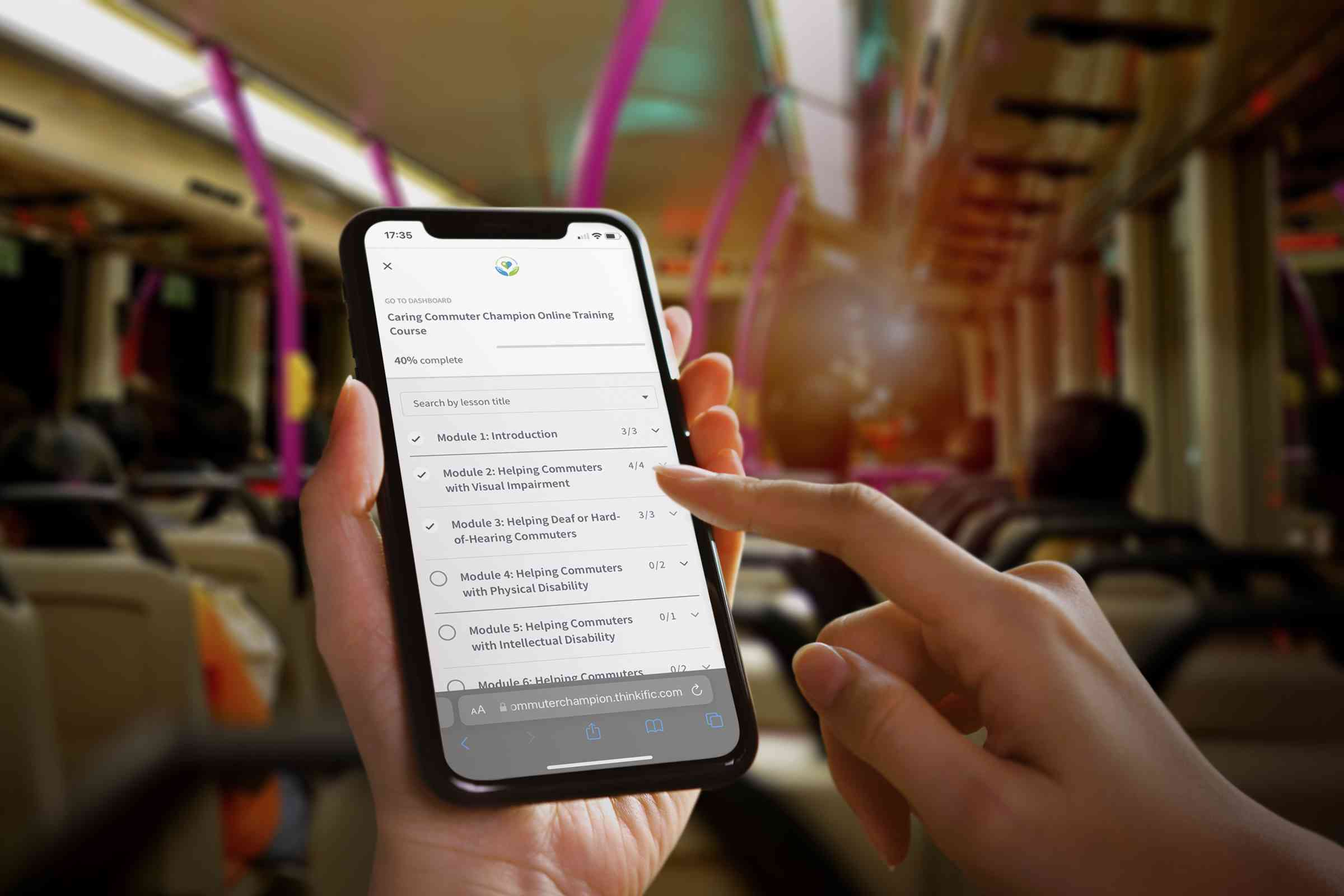 accessing Caring Commuter Champion elearning page via smartphone while on the bus